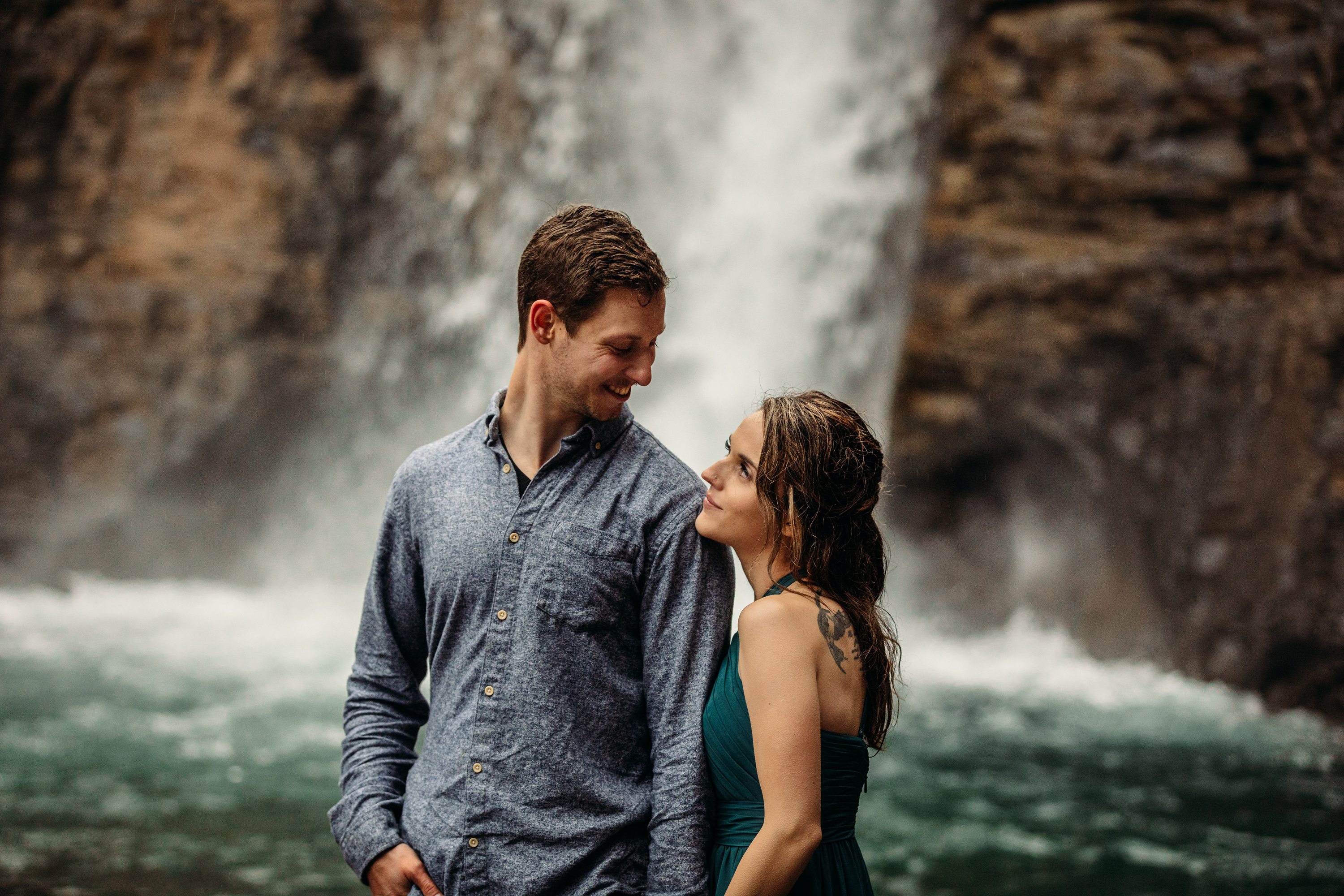  couple waterfall photos, calgary engagement photos