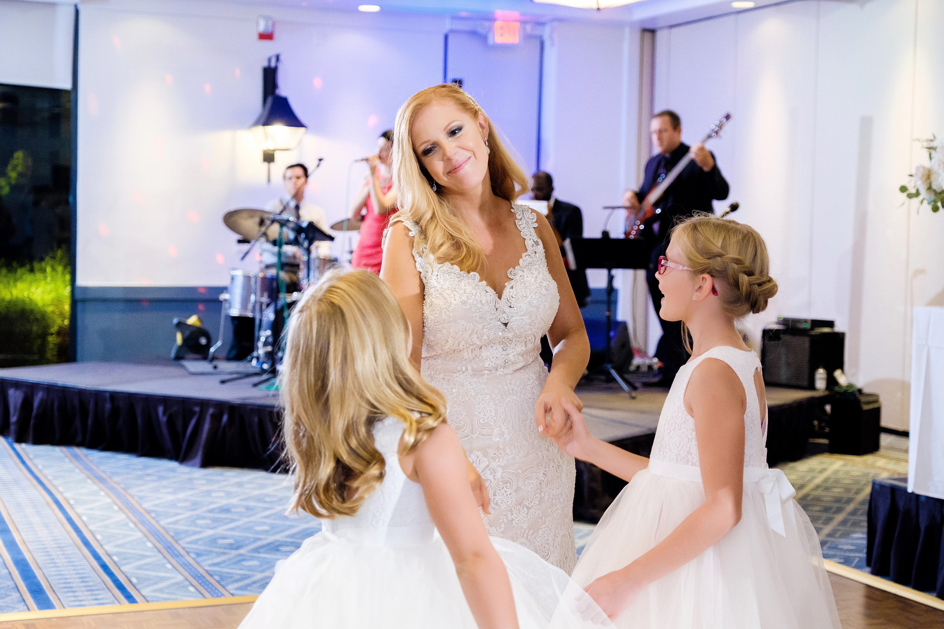 az wedding photographer,bride dancing with her daughters at her wedding at The Scott Resort