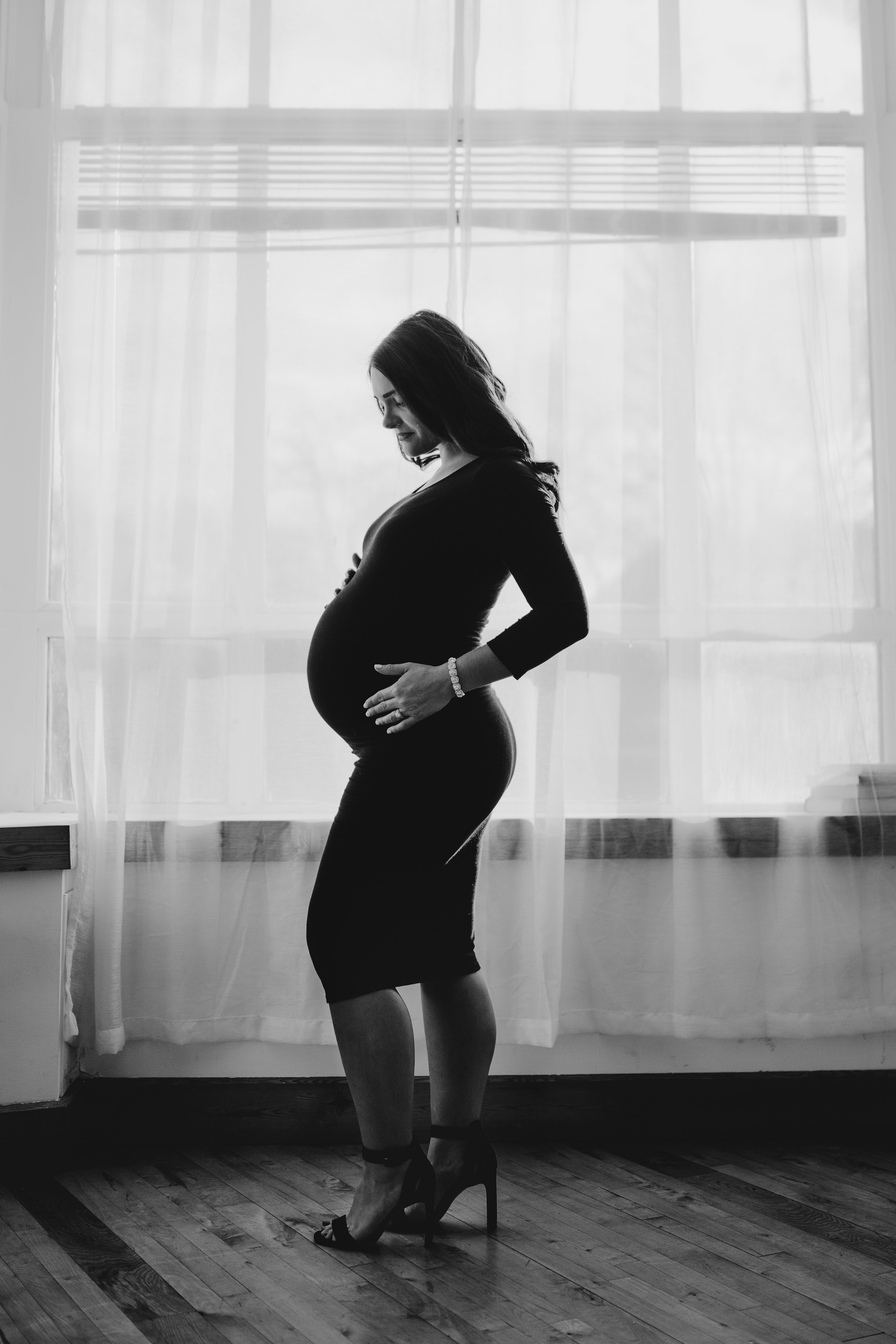 Maternity portrait in studio,black and white silhouette of pregnant mother, modern maternity portrait with spouse, natural light maternity portraits