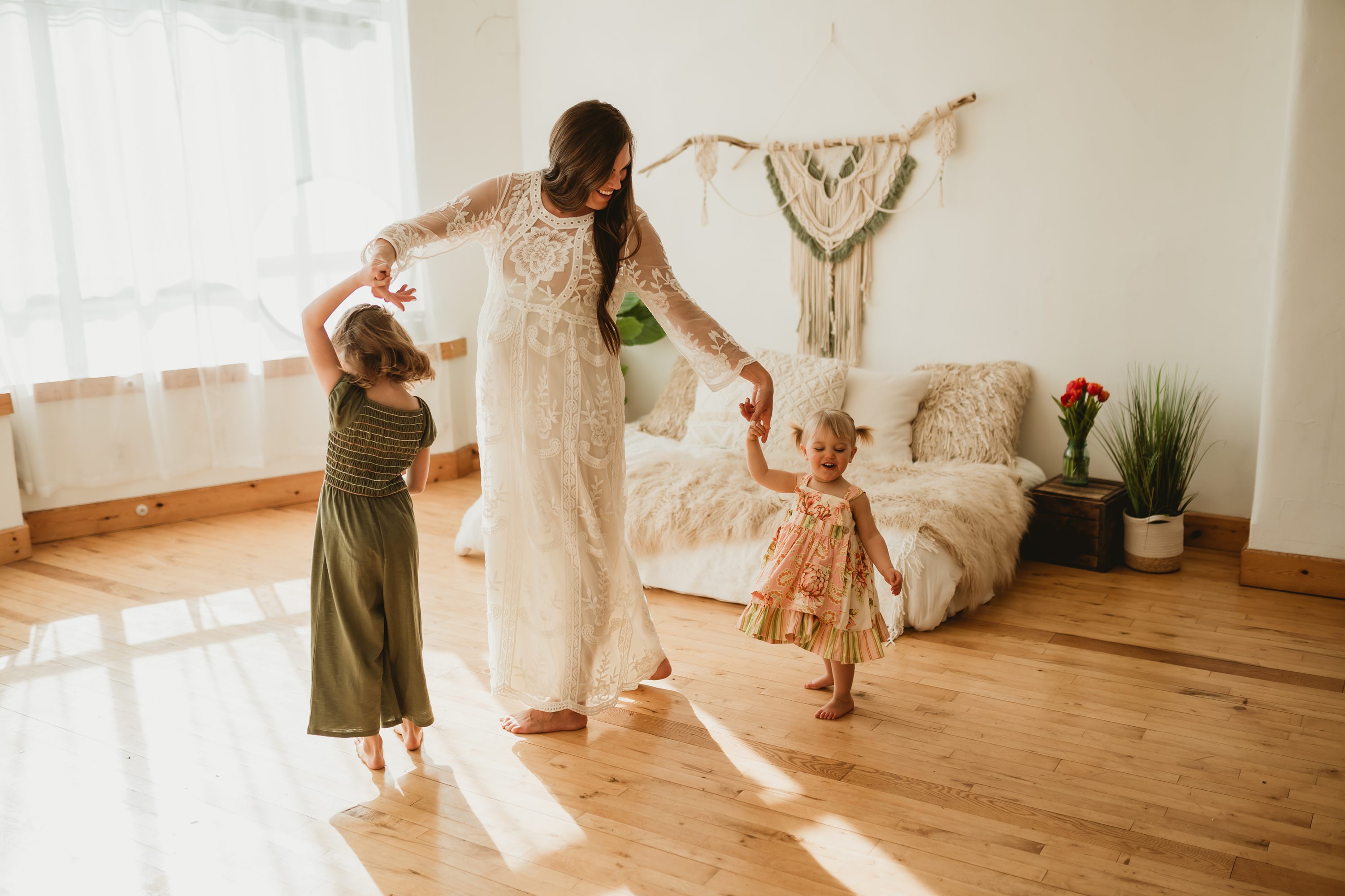 mommy and me session,mom dancing with daughters,laura hollander mini session,portage michigan studio session,studio portraits,modern boho studio session