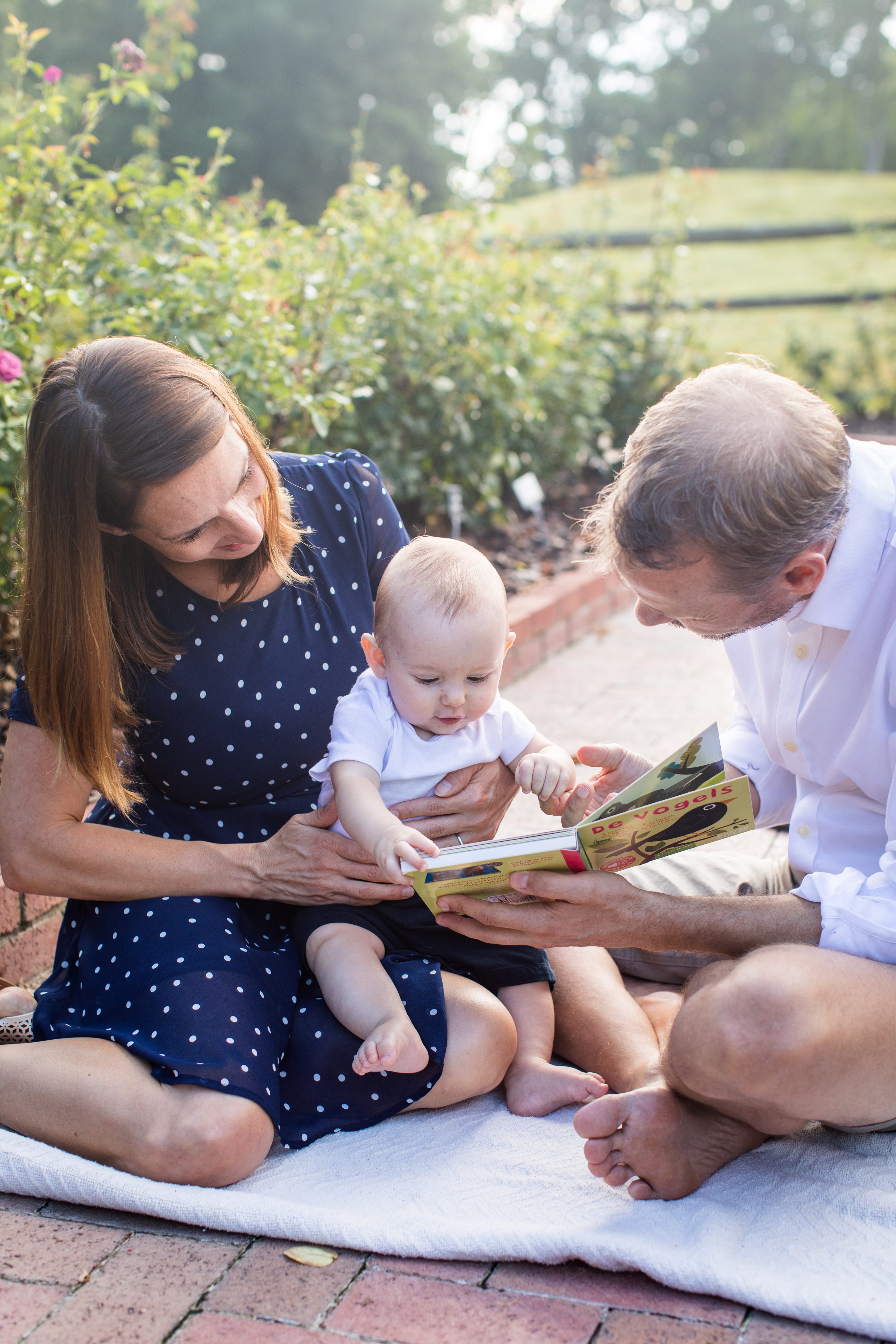 Bolin Creek Trail,Raleigh Family Photography,baby reading in garden