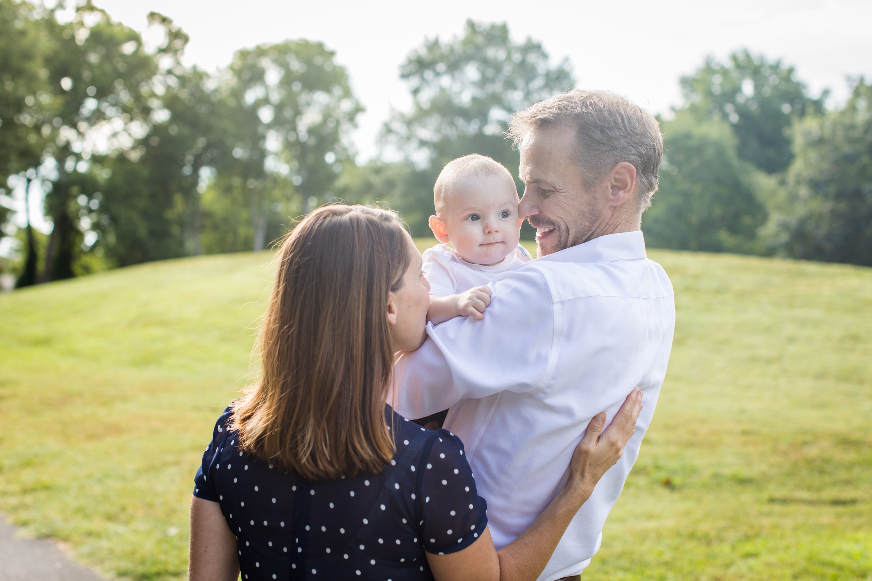 Baby Photos, NC,baby photos outdoors,parents similing with baby