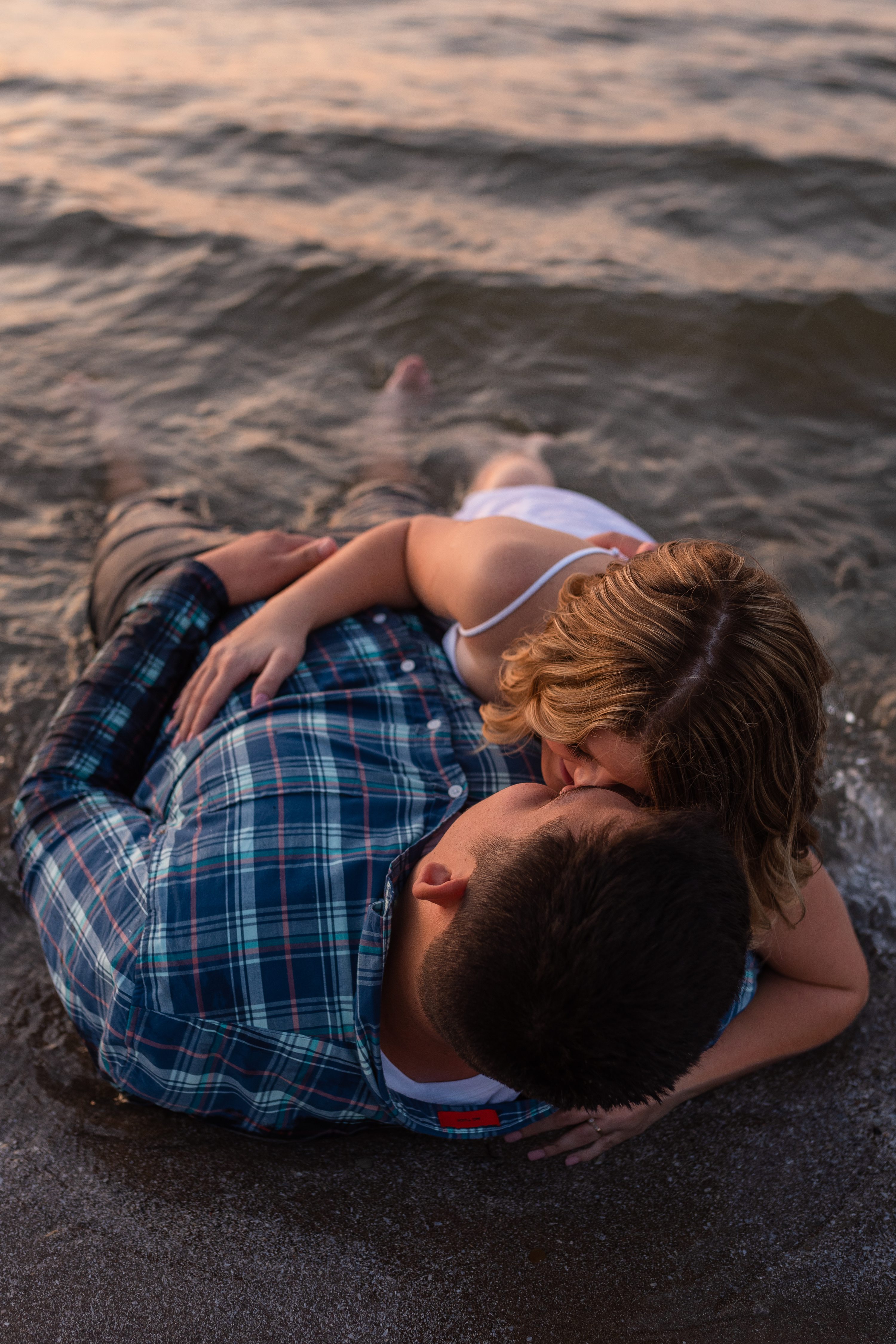 Cleveland Photographer, Downtown Cleveland, Engagement Photographer, Engagement Session, Hannah + Tyler, Hannh and Tyler, Lake Erie, Lake Erie Engagement Session, Lake Erie photos, Ohio Photographer, Wedding Photographer, cleveland engagement photographer, couple in lake, couple in water, couples session, couples session in water, ohio engagement photographer, photos in water, sunset photos