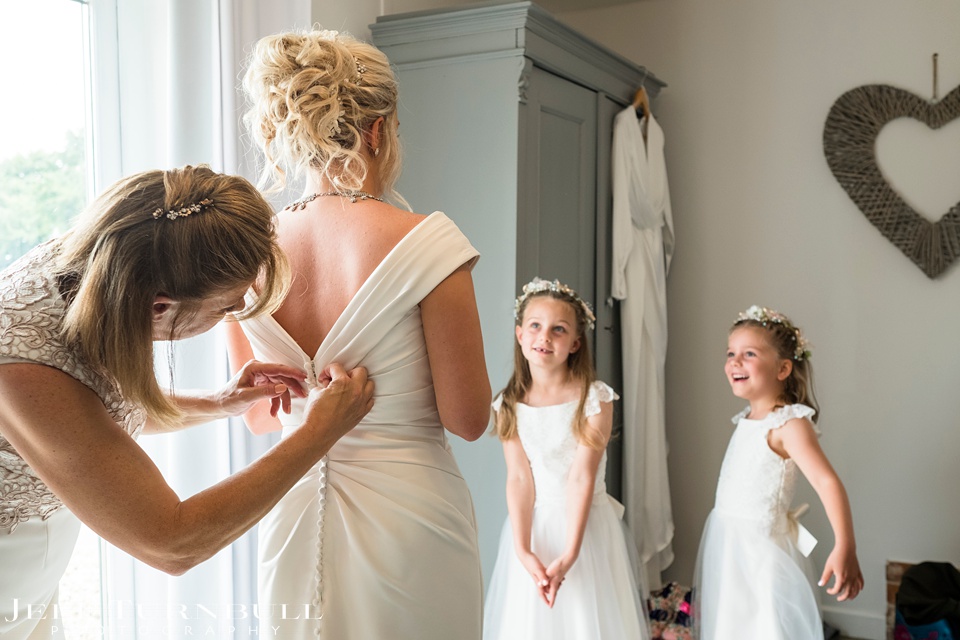 Summer Wedding,Best Wedding Venue Essex,Flower Girls Looking at the Bride