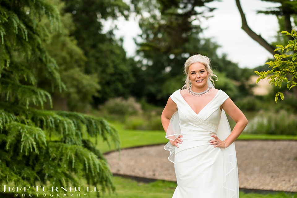 Villiers Barn Wedding Venue,Essex Wedding Venue,Bride in her Dress posing