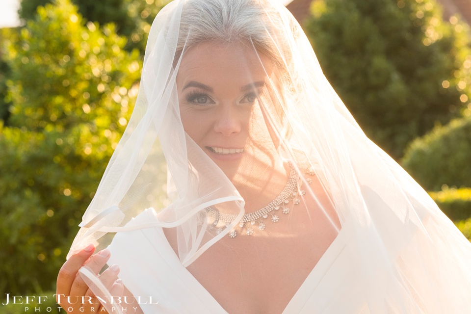 Villietrs Barn Recomended Wedding Photographer,Essex Barn Wedding,Bride Portrait wearing her veil