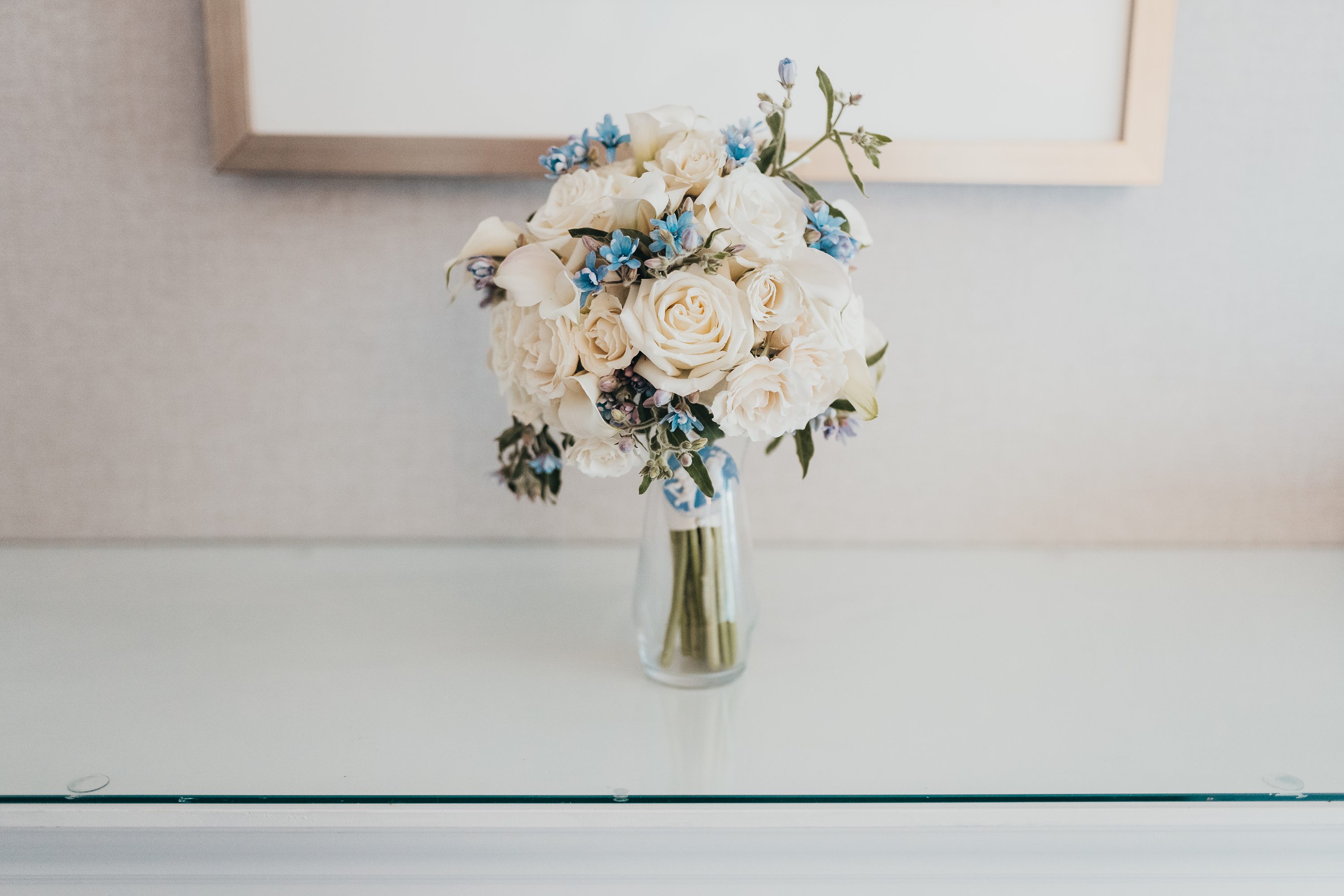pandemic wedding,Boston wedding,artistic blossoms boston,white roses and blue accent flowers