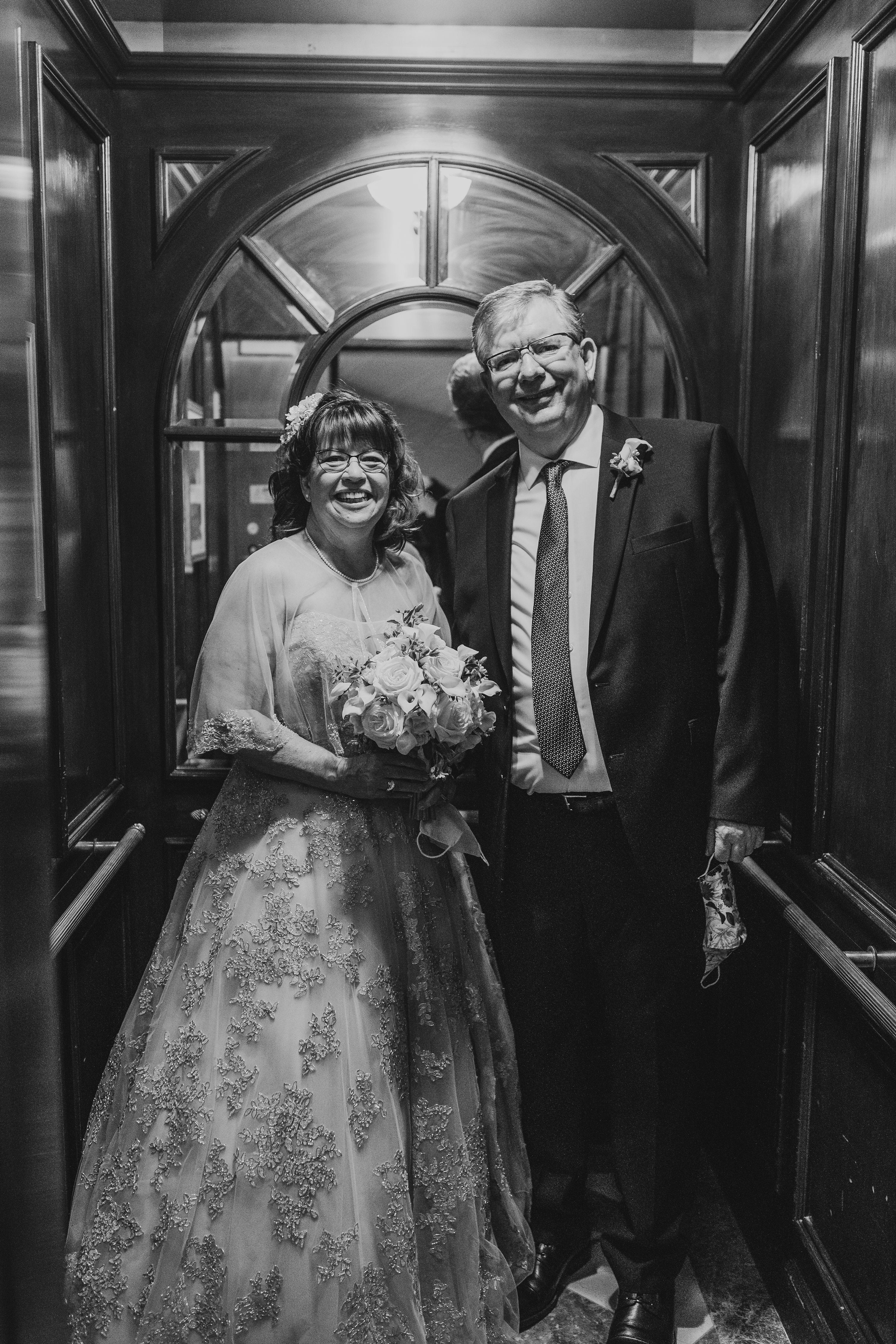 Boston Wedding Photographer,2020 wedding,couple smiling in an elevator,fairmont copley plaza