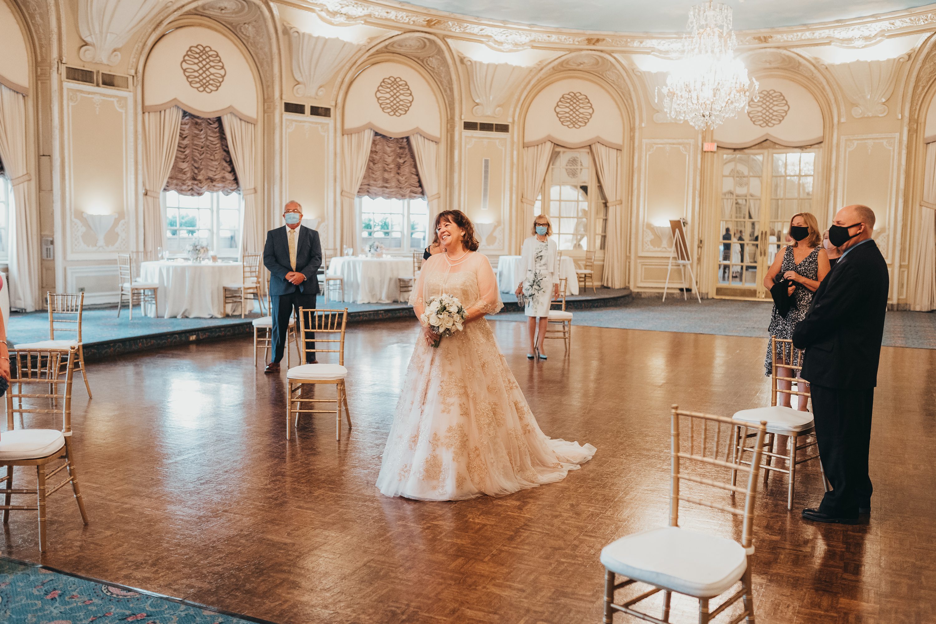 sony alpha a7iii,fairmont coply,bride walking down the aisle with smile on her face