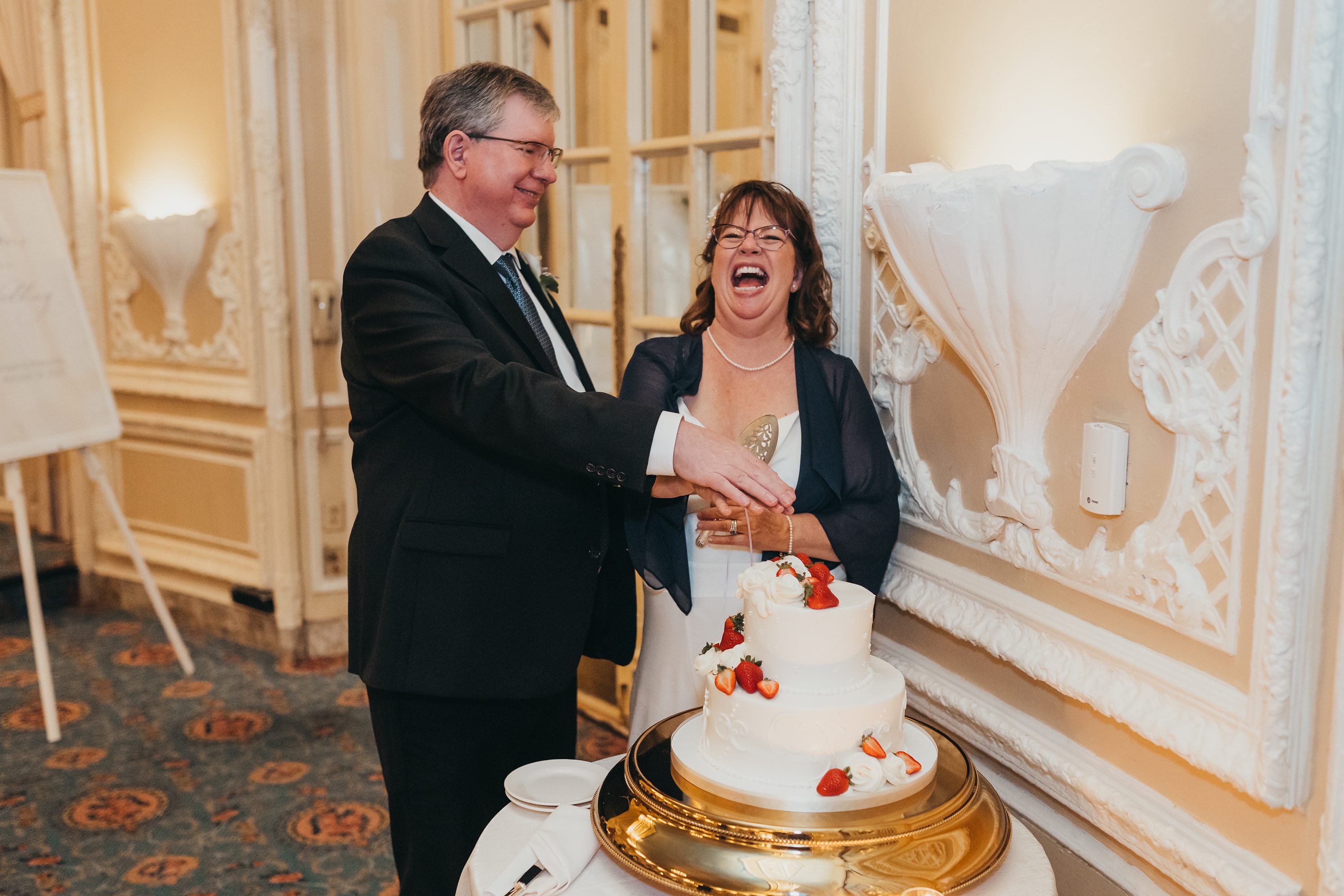 sony alpha a7iii,Boston wedding,dessert works bakery boston,couple lauging before cutting wedding cake
