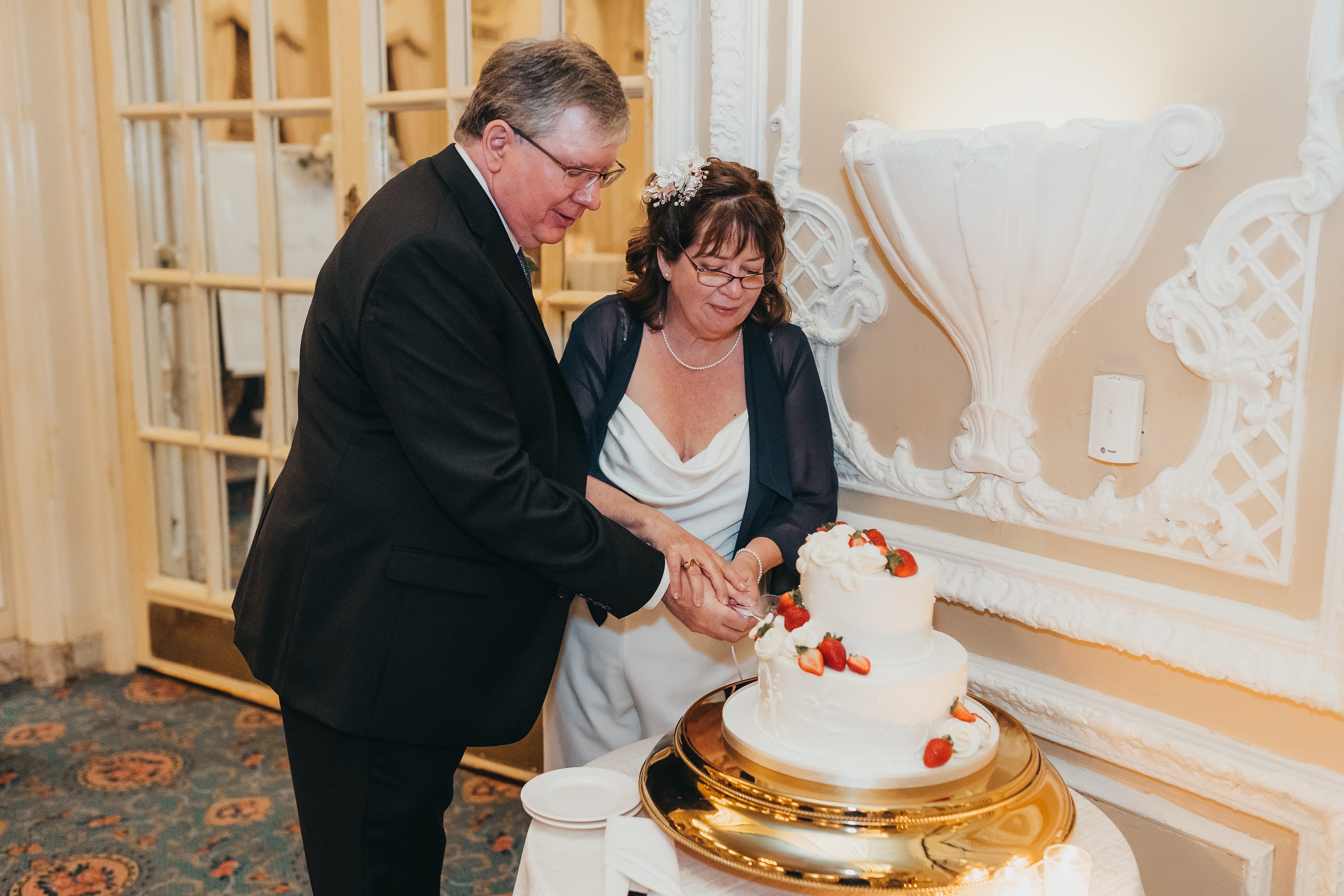 covid wedding,2020 wedding,dessert works bakery boston,couple cutting wedding cake
