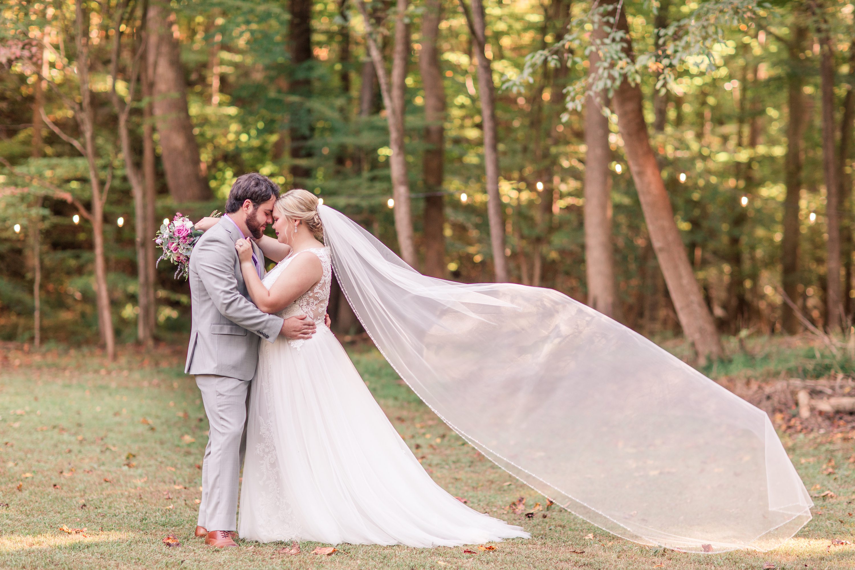 Purple bridemaids dresses, grey suits