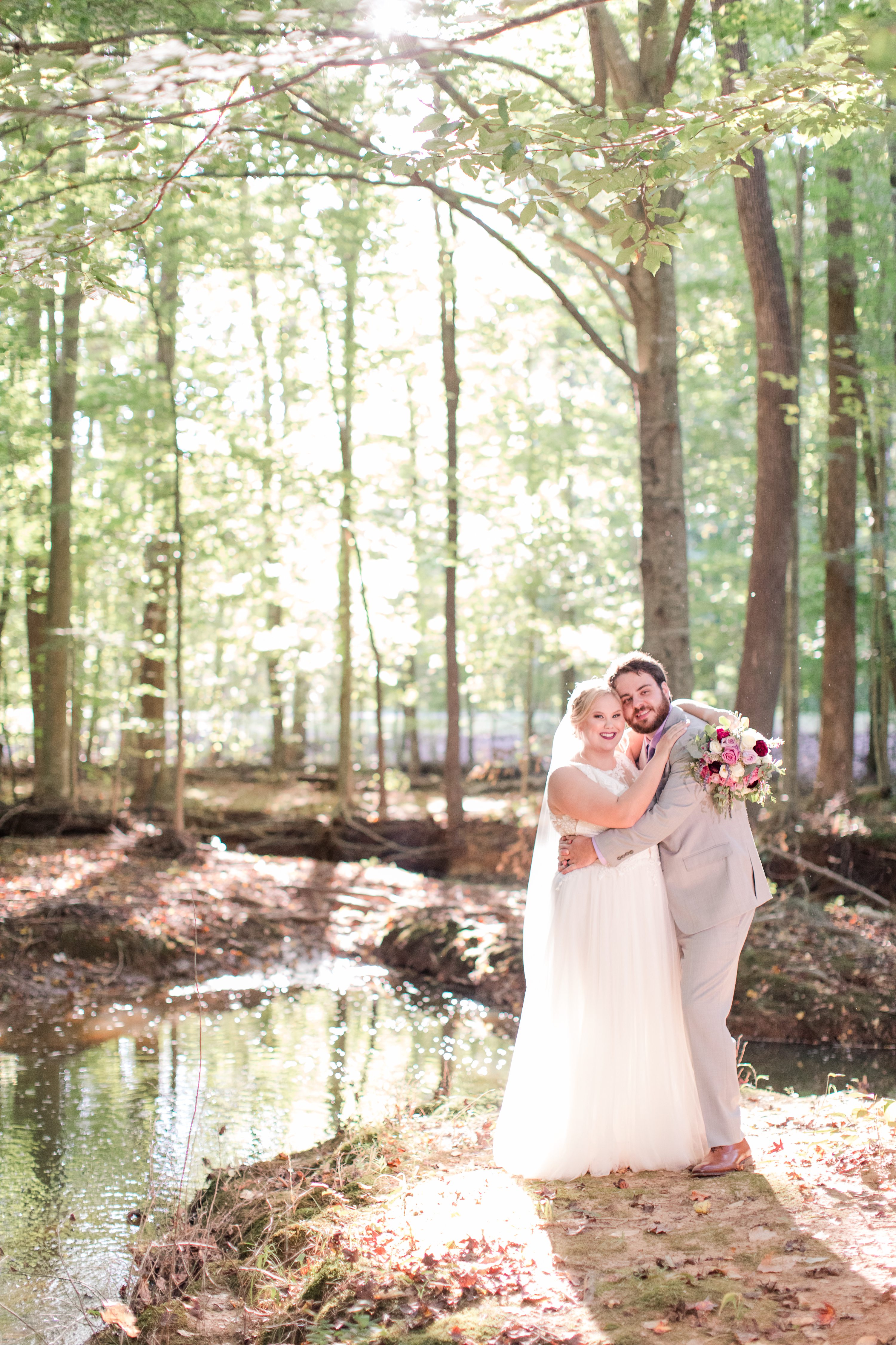 Purple bridemaids dresses, pink and white wedding bouquet.