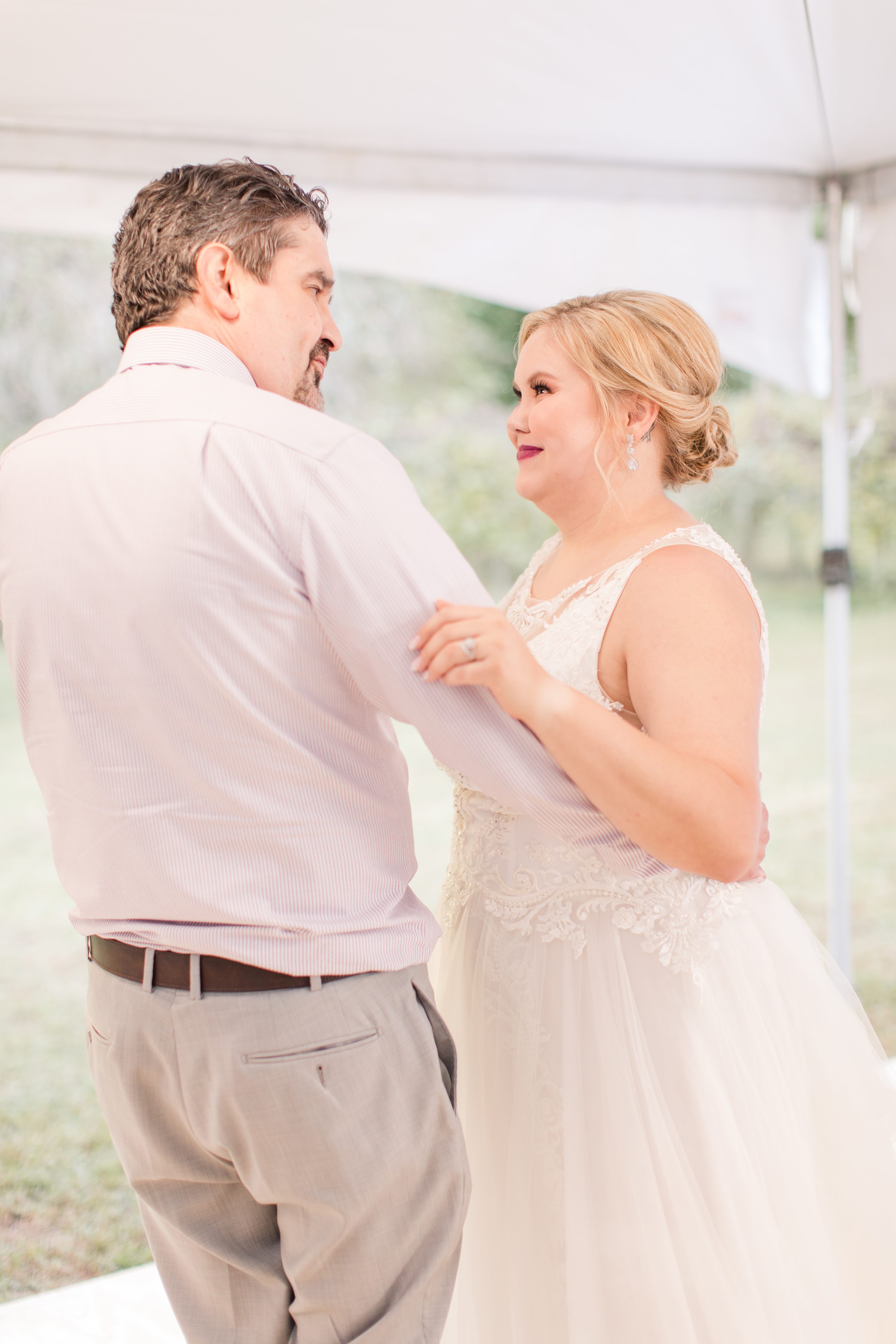  pink and white wedding bouquet.,Purple bridemaids dresses