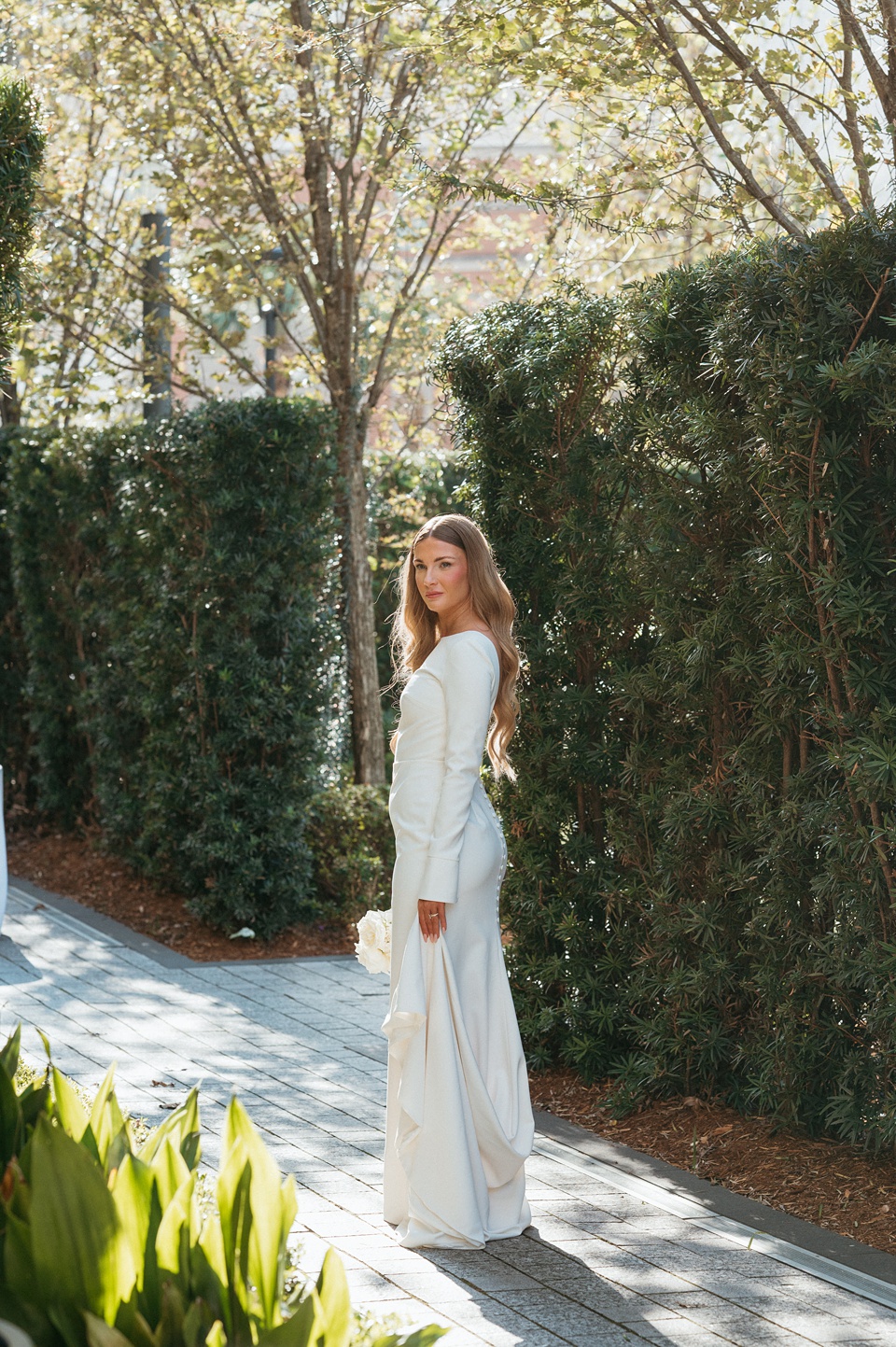 Nola Wedding,Bride Alexandra in her Vagabond Bridal gown holding a romantic bouquet by Leaf and Petal