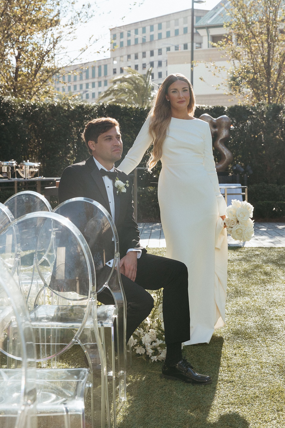 Bride Alexandra in her Vagabond Bridal gown holding a romantic bouquet by Leaf and Petal,Houston Wedding