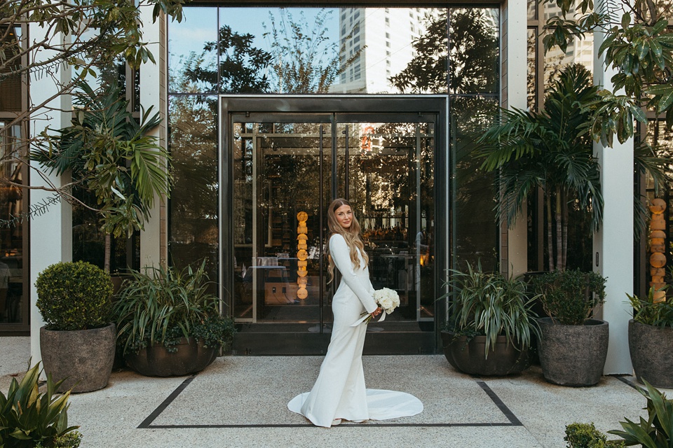 Four Seasons New Orleans,Bride and groom exchanging vows in the courtyard of the Four Seasons New Orleans.