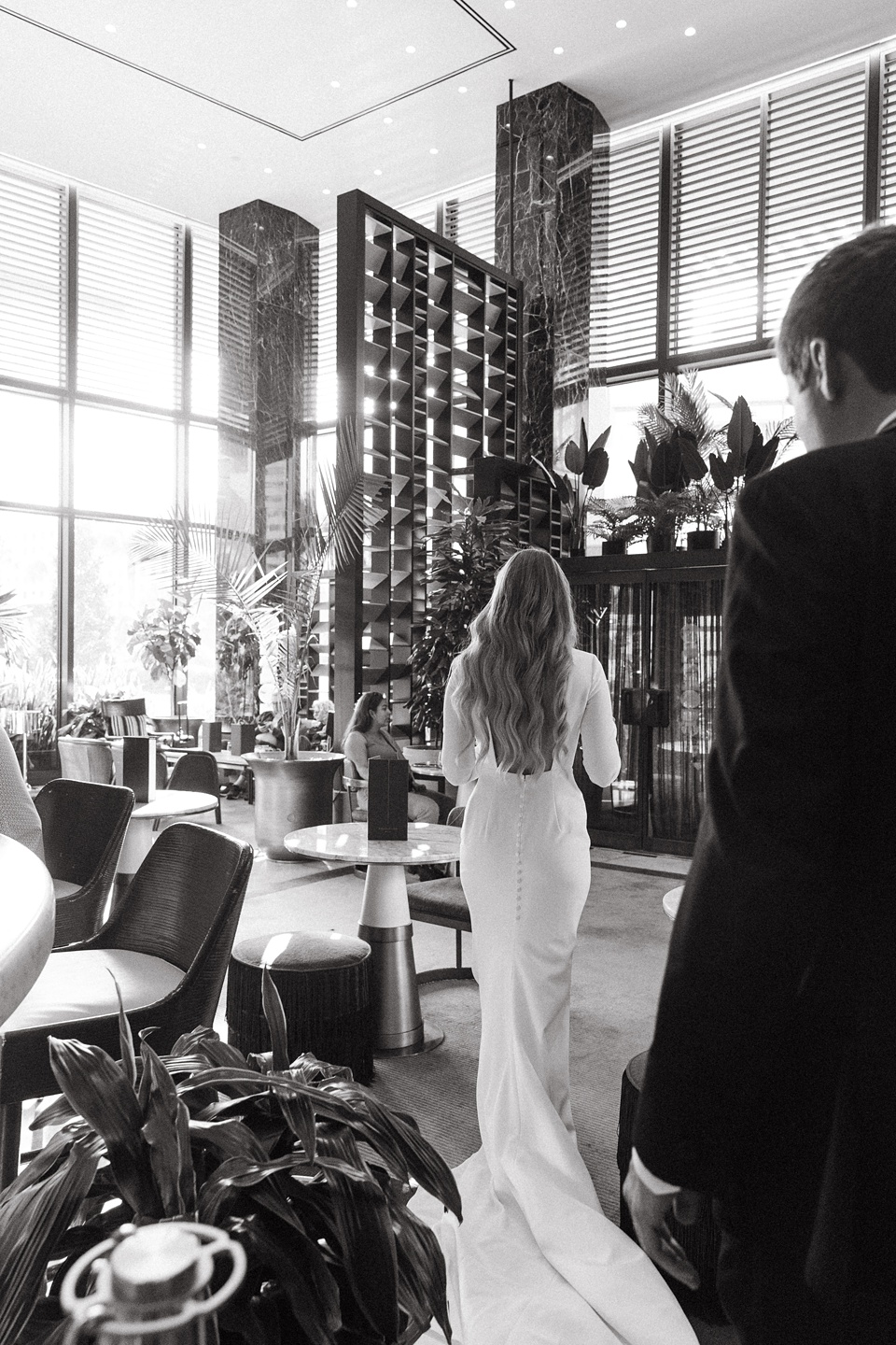 Nola Wedding,Bride and groom exchanging vows in the courtyard of the Four Seasons New Orleans.