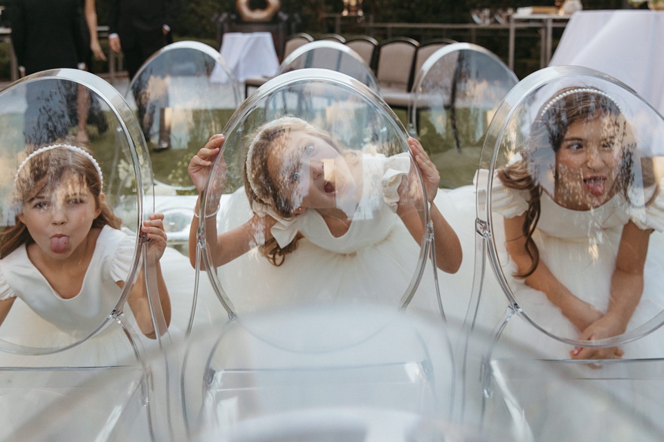 Bride and groom exchanging vows in the courtyard of the Four Seasons New Orleans.