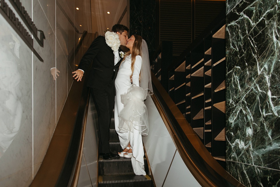 Houston Wedding,Bride Alexandra in her Vagabond Bridal gown holding a romantic bouquet by Leaf and Petal