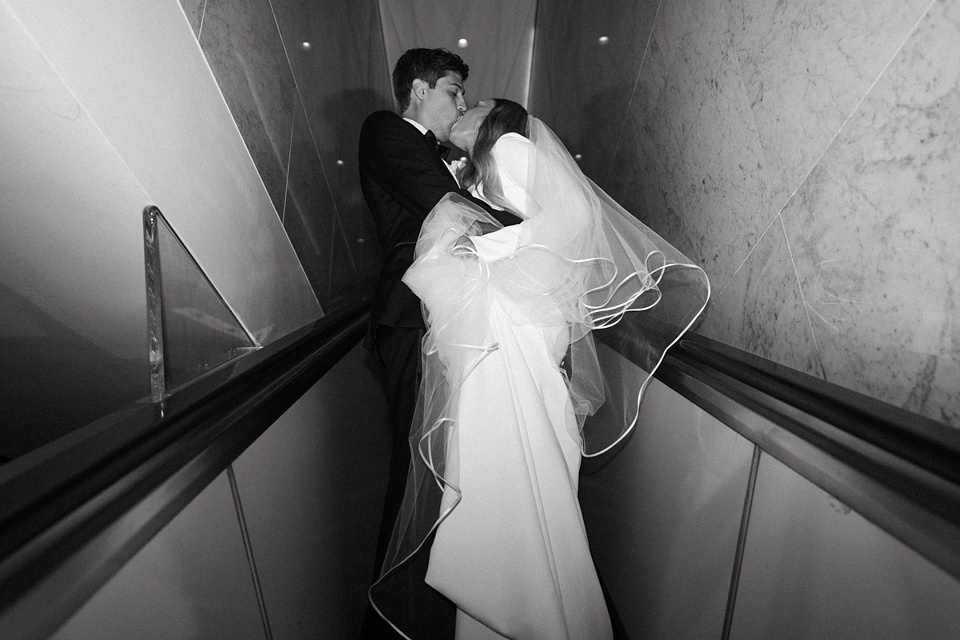 Houston Wedding,Bride and groom exchanging vows in the courtyard of the Four Seasons New Orleans.