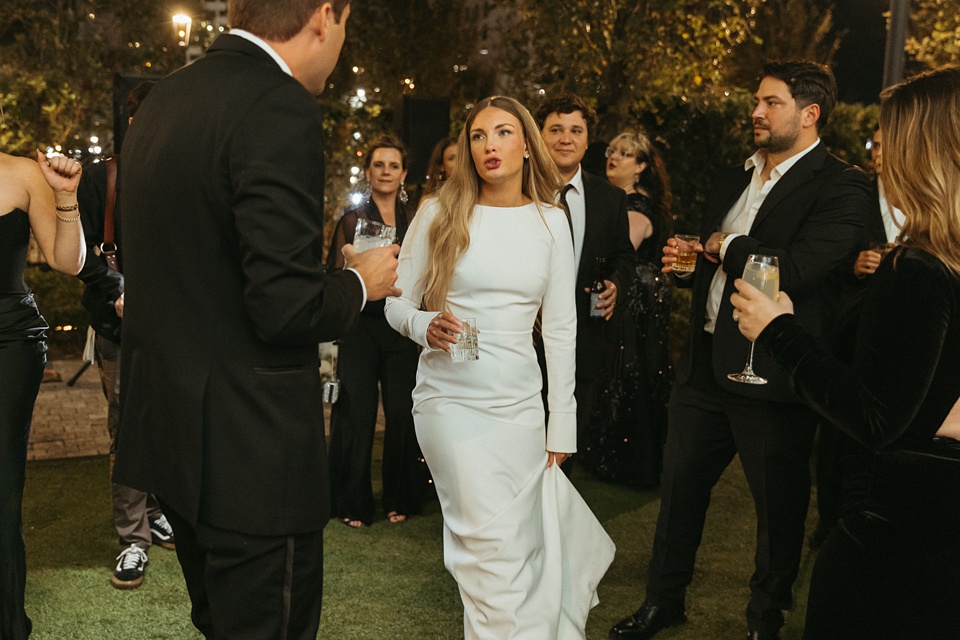 The Four Seasons courtyard set up for an intimate outdoor wedding ceremony.,Romantic floral arrangements by Leaf and Petal