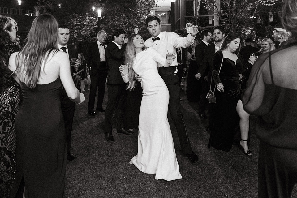 Houston Wedding,Bride Alexandra in her Vagabond Bridal gown holding a romantic bouquet by Leaf and Petal