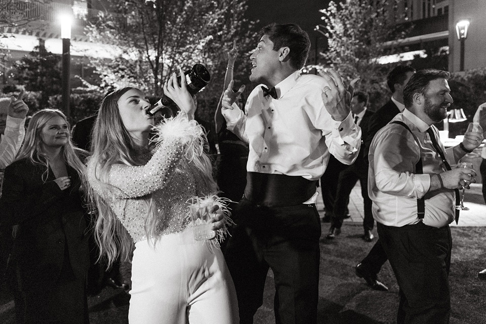 Bride Alexandra in her Vagabond Bridal gown holding a romantic bouquet by Leaf and Petal,Romantic floral arrangements by Leaf and Petal