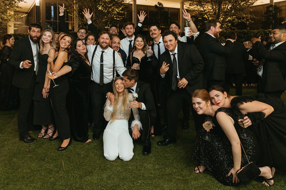 Bride and groom exchanging vows in the courtyard of the Four Seasons New Orleans.,Four Seasons New Orleans