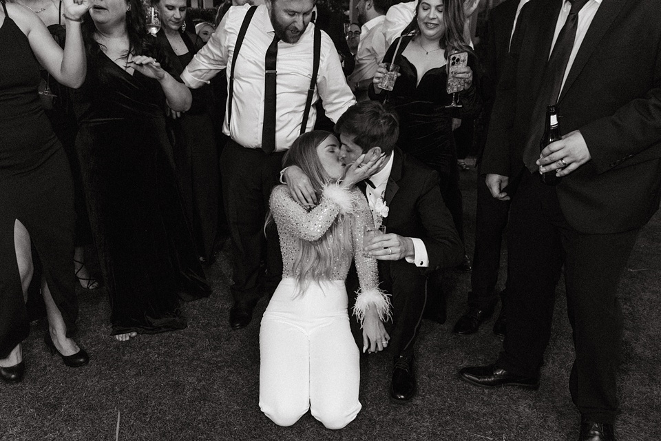 The Four Seasons courtyard set up for an intimate outdoor wedding ceremony.,Bride and groom exchanging vows in the courtyard of the Four Seasons New Orleans.