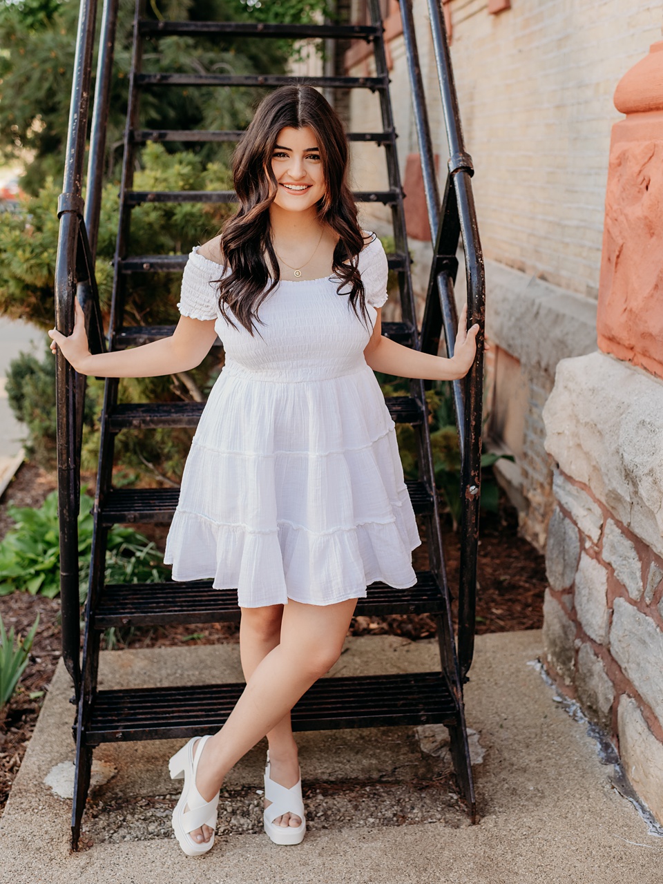 Senior Photos,,studio photos Barrington IL senior photographer capturing Barrington High School senior girl during outdoor session in Woodstock Square