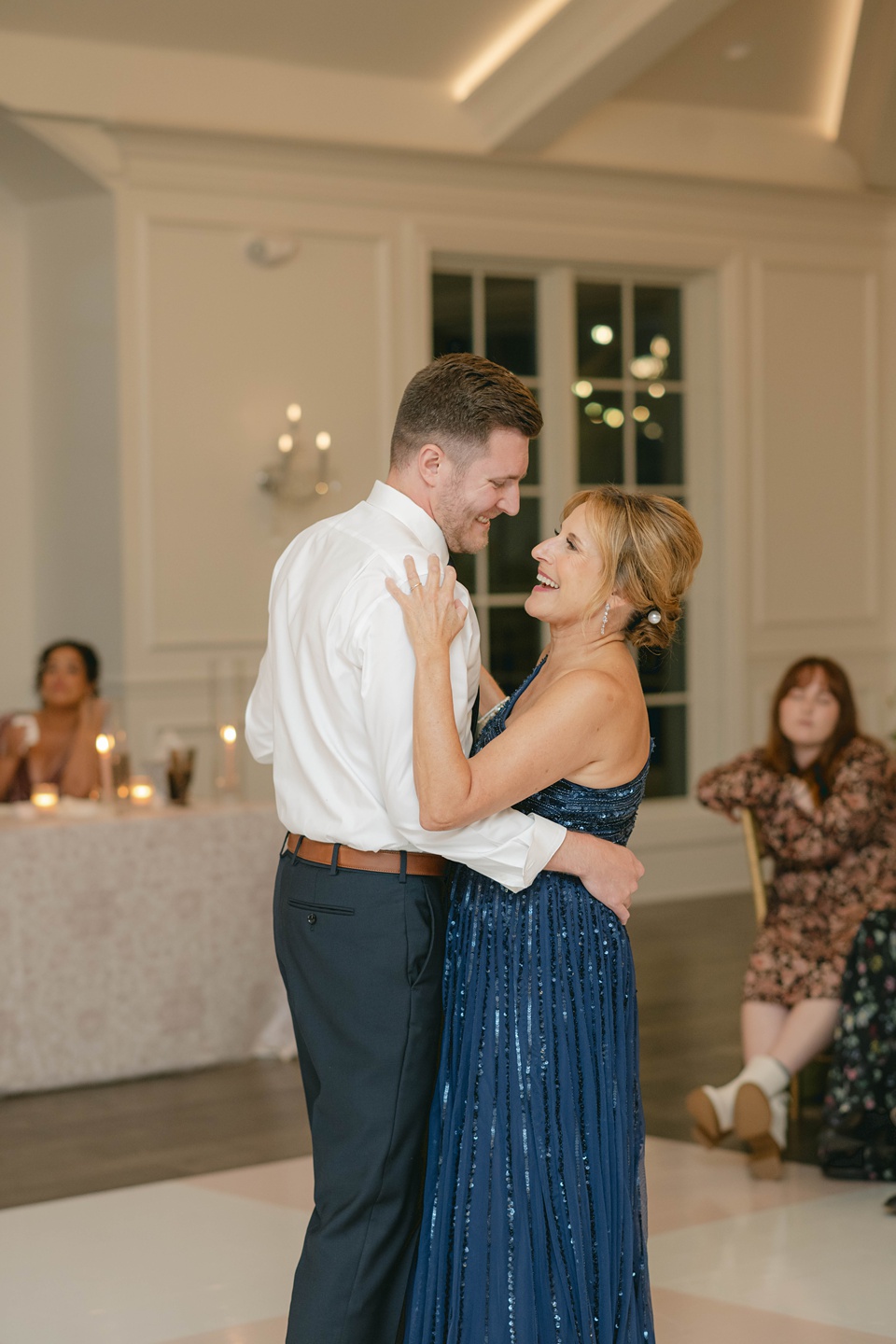  the anticipation reached a crescendo. Guests gathered under the sprawling oak trees, complete with a pool table and big screen for catching up on the football game. These candid moments of camaraderie added a touch of levity to the day's proceedings