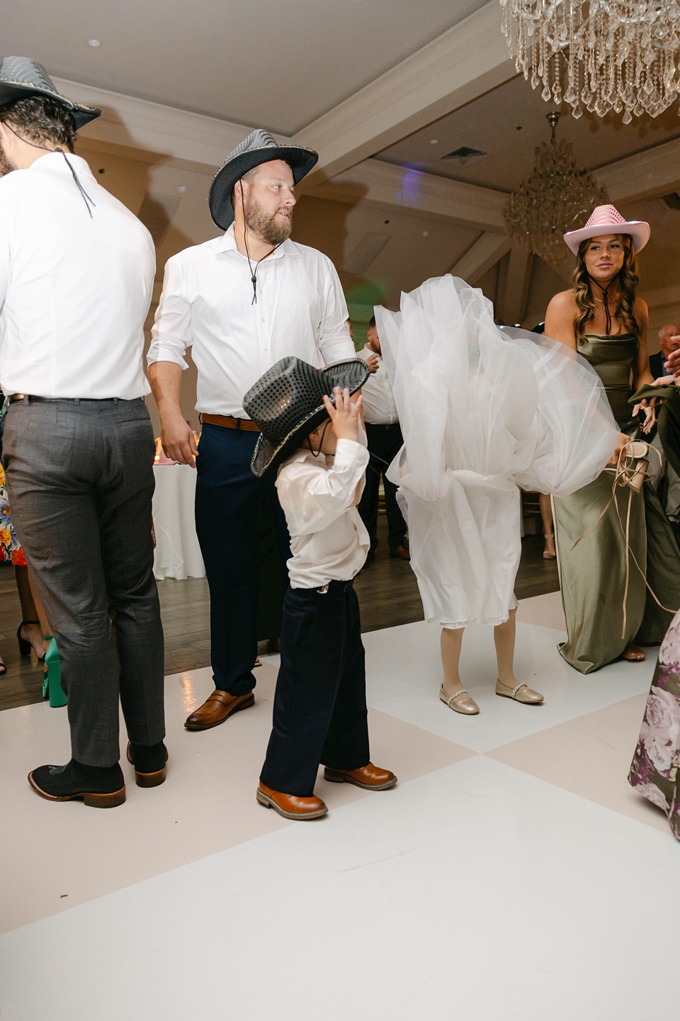  we are reminded of the beauty and magic of true love., the couple bid farewell to their guests with a grand gesture. Silver streamers filled the air as the bride and groom made their way to a vintage luxury car