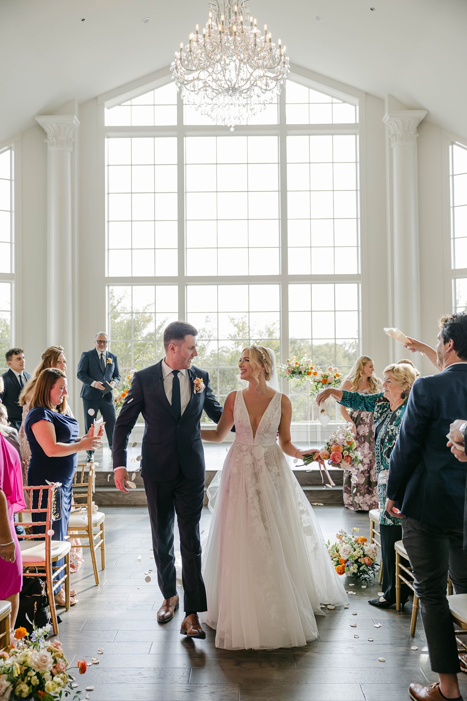  the couple bid farewell to their guests with a grand gesture. Silver streamers filled the air as the bride and groom made their way to a vintage luxury car, and joy. From the impeccable design to the heartfelt moments shared between family and friends