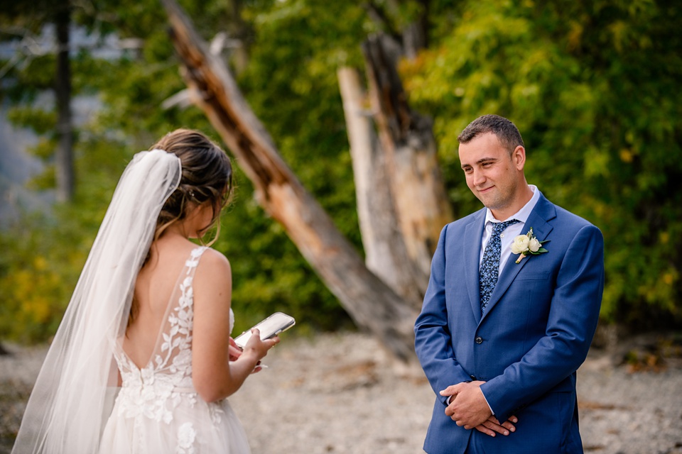 Perfect Lakeside elopement at Rising Sun along St. Mary Lakeshore in Glacier National Park surrounded by friends and family.,Mountain Wedding,Adventure Elopement