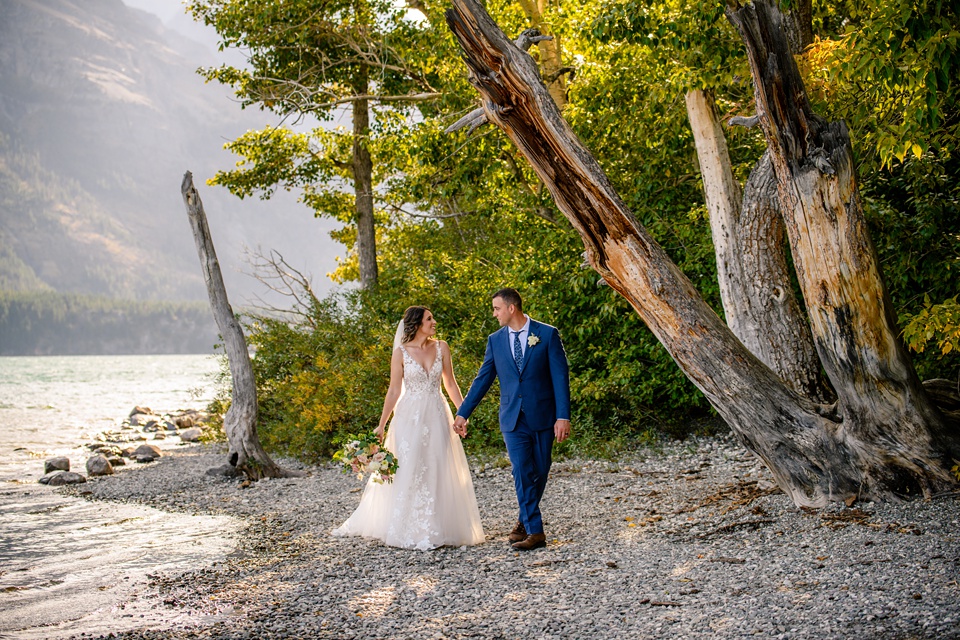 Perfect Lakeside elopement at Rising Sun along St. Mary Lakeshore in Glacier National Park surrounded by friends and family.,Mountain Wedding,Adventure Elopement