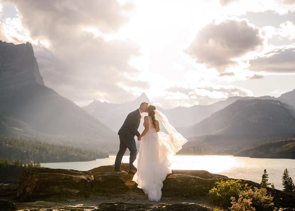 Perfect Lakeside elopement at Rising Sun along St. Mary Lakeshore in Glacier National Park surrounded by friends and family.,Mountain Wedding,Adventure Elopement