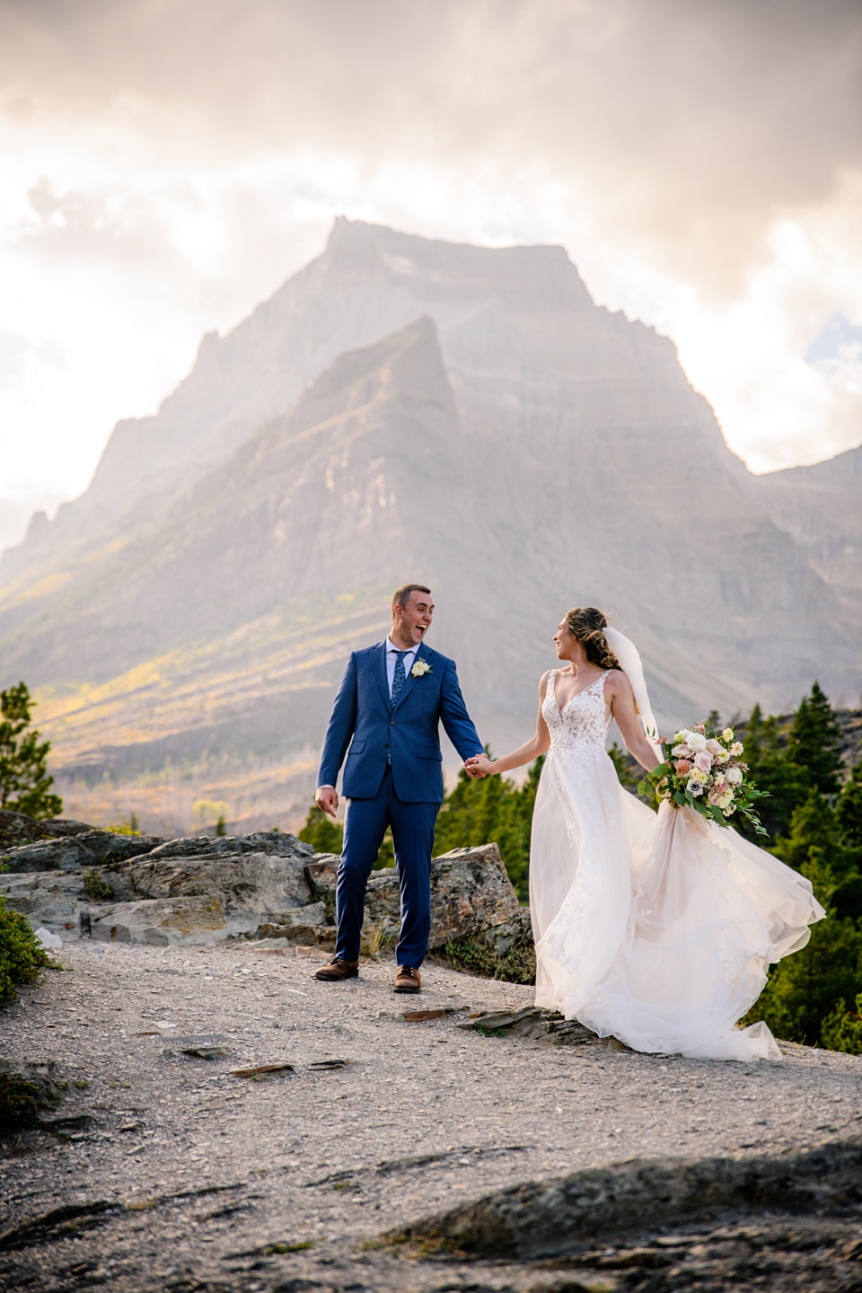 Perfect Lakeside elopement at Rising Sun along St. Mary Lakeshore in Glacier National Park surrounded by friends and family.,Mountain Wedding,Adventure Elopement