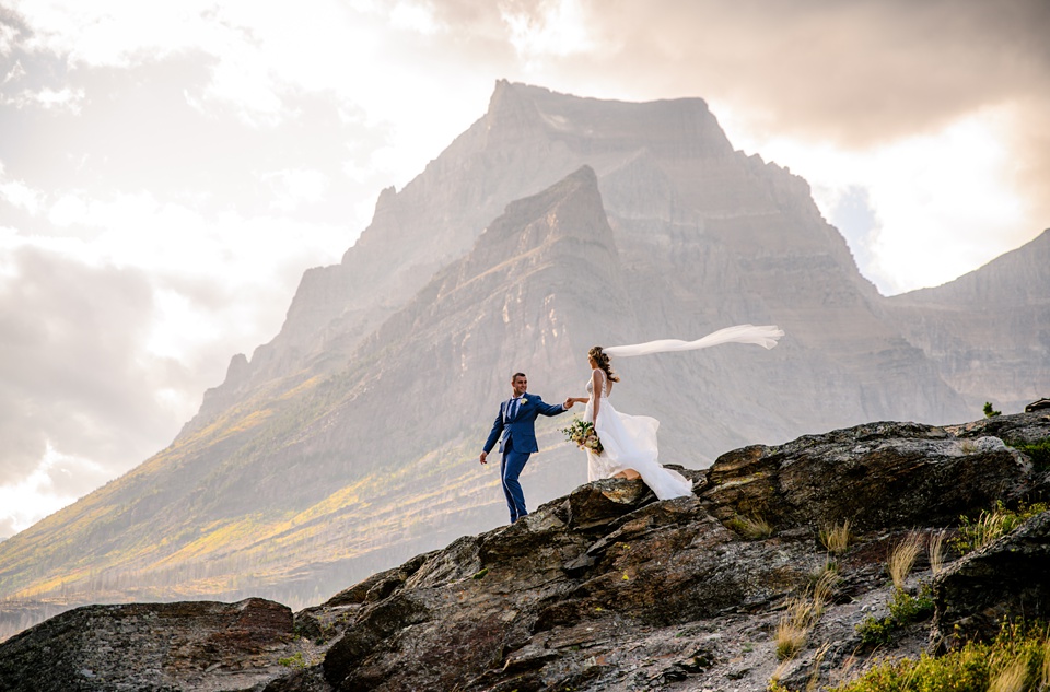 Perfect Lakeside elopement at Rising Sun along St. Mary Lakeshore in Glacier National Park surrounded by friends and family.,Mountain Wedding,Adventure Elopement