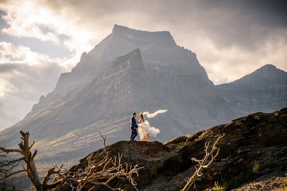 Perfect Lakeside elopement at Rising Sun along St. Mary Lakeshore in Glacier National Park surrounded by friends and family.,Mountain Wedding,Adventure Elopement