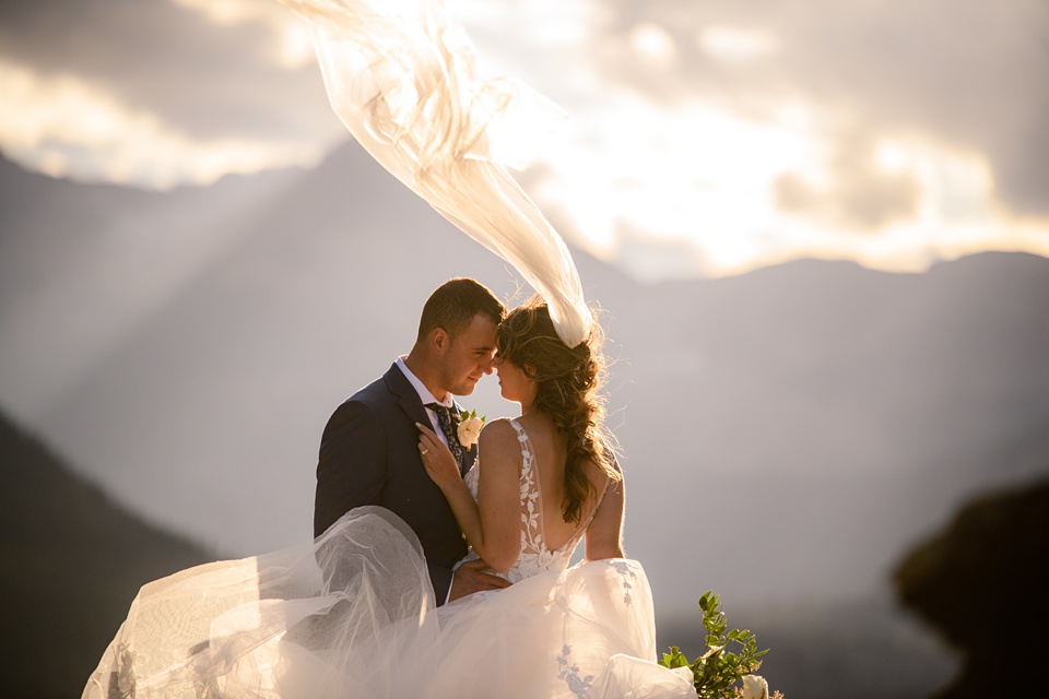 Perfect Lakeside elopement at Rising Sun along St. Mary Lakeshore in Glacier National Park surrounded by friends and family.,Mountain Wedding,Adventure Elopement