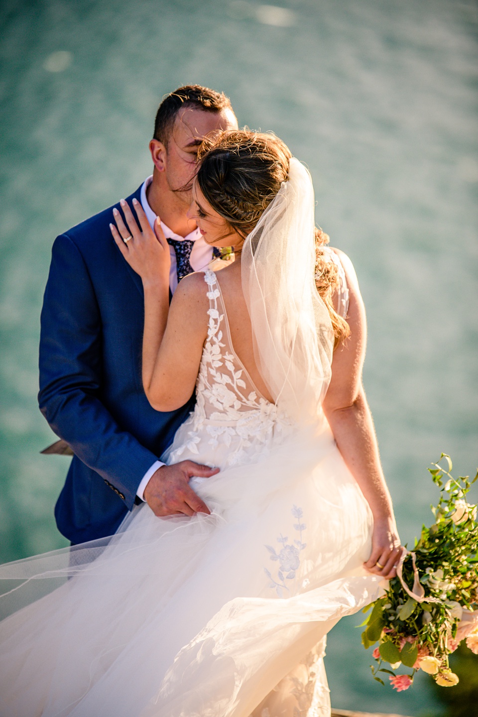 Perfect Lakeside elopement at Rising Sun along St. Mary Lakeshore in Glacier National Park surrounded by friends and family.,Mountain Wedding,Adventure Elopement