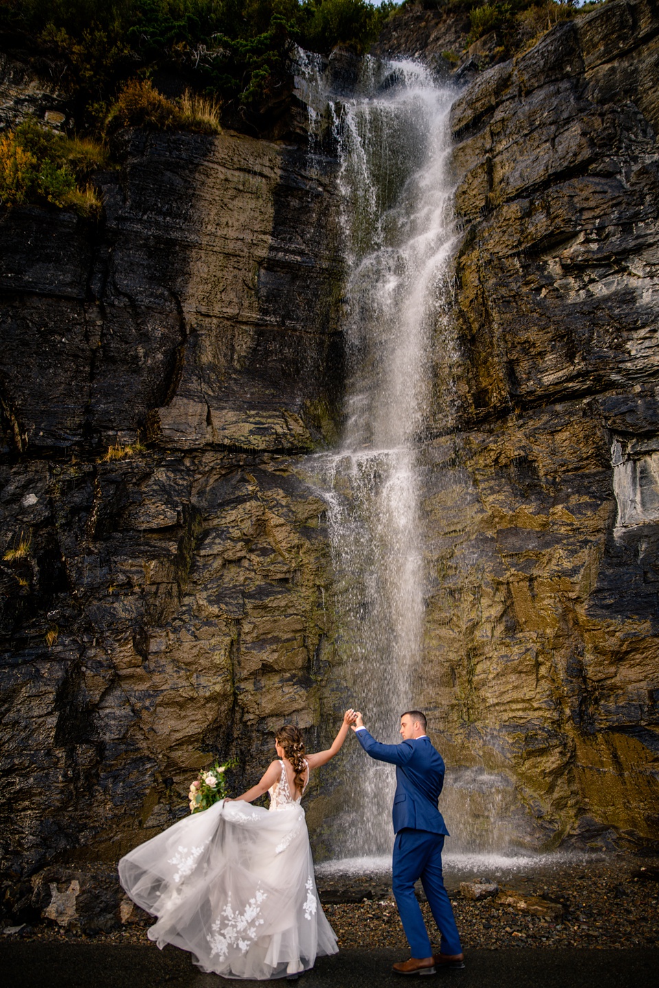 Perfect Lakeside elopement at Rising Sun along St. Mary Lakeshore in Glacier National Park surrounded by friends and family.,Mountain Wedding,Adventure Elopement