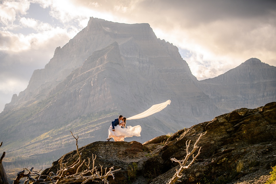 Perfect Lakeside elopement at Rising Sun along St. Mary Lakeshore in Glacier National Park surrounded by friends and family.,Mountain Wedding,Adventure Elopement