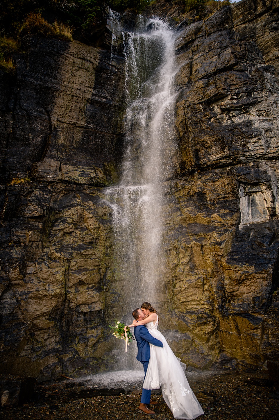 Perfect Lakeside elopement at Rising Sun along St. Mary Lakeshore in Glacier National Park surrounded by friends and family.,Mountain Wedding,Adventure Elopement