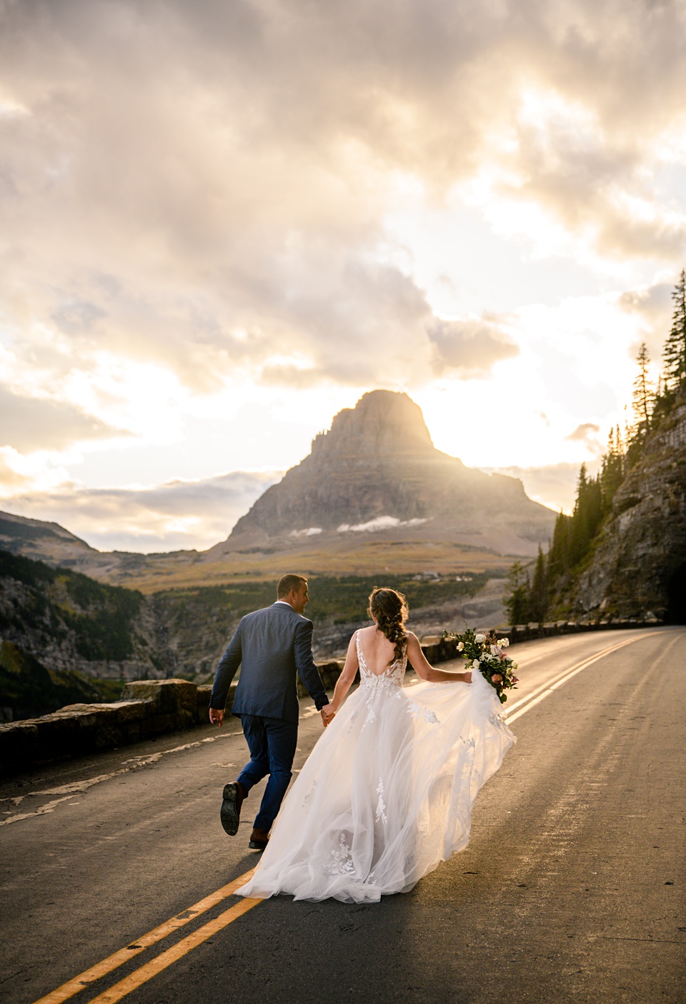 Perfect Lakeside elopement at Rising Sun along St. Mary Lakeshore in Glacier National Park surrounded by friends and family.,Mountain Wedding,Adventure Elopement