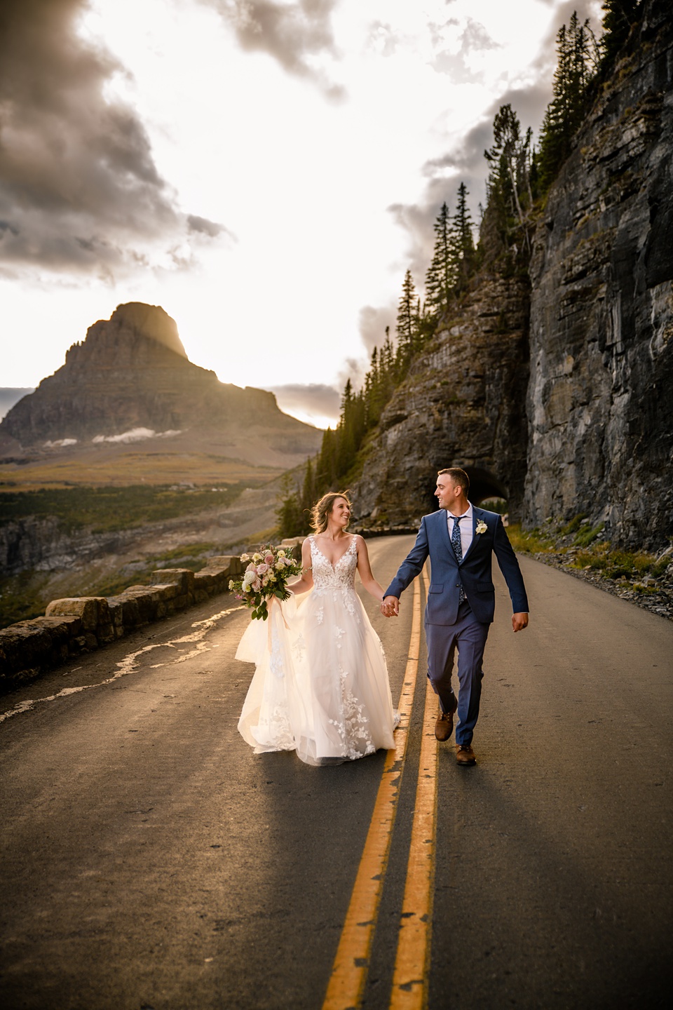 Perfect Lakeside elopement at Rising Sun along St. Mary Lakeshore in Glacier National Park surrounded by friends and family.,Mountain Wedding,Adventure Elopement