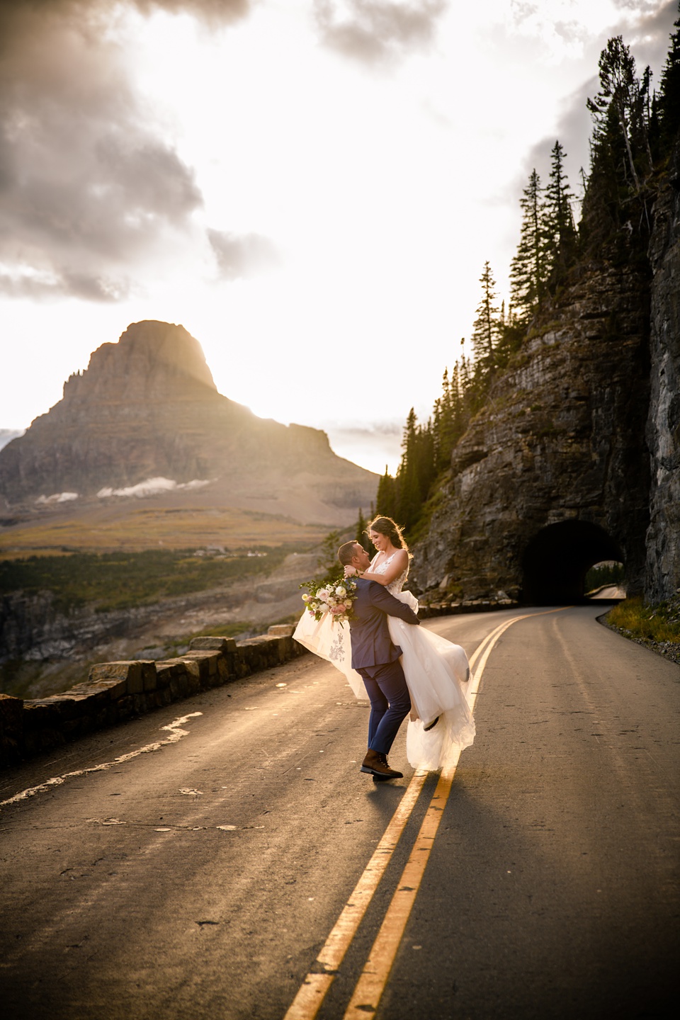 Perfect Lakeside elopement at Rising Sun along St. Mary Lakeshore in Glacier National Park surrounded by friends and family.,Mountain Wedding,Adventure Elopement