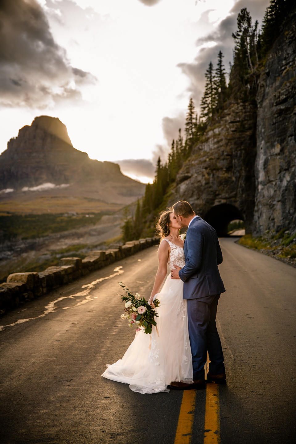 Perfect Lakeside elopement at Rising Sun along St. Mary Lakeshore in Glacier National Park surrounded by friends and family.,Mountain Wedding,Adventure Elopement