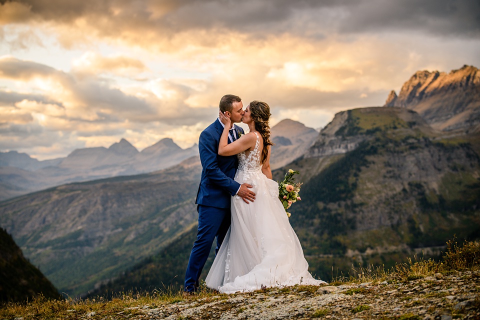 Perfect Lakeside elopement at Rising Sun along St. Mary Lakeshore in Glacier National Park surrounded by friends and family.,Mountain Wedding,Adventure Elopement